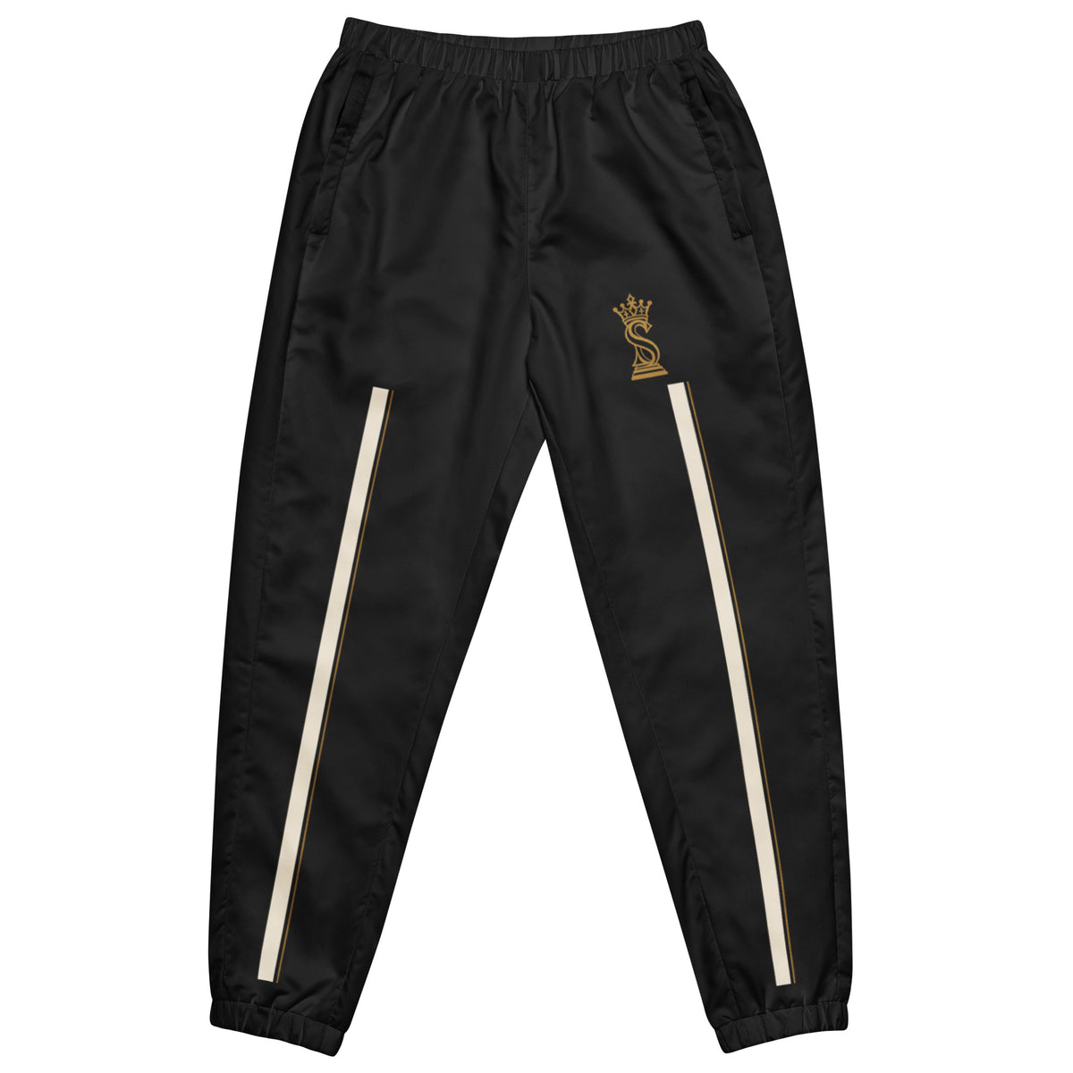 Front view of the black Swindle Queen track pants with white side stripes and gold crowned-S queen emblem on the thigh.